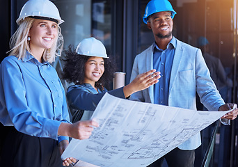 Image showing Diversity, team and creative architect people working on a site plan with blueprint for construction or building. Business contractors in teamwork, planning and strategy with paper design layout.