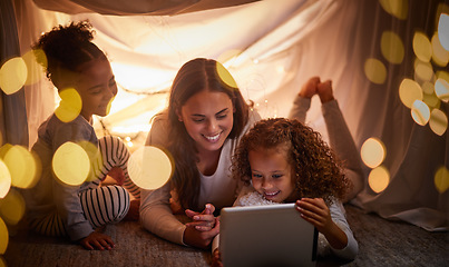 Image showing Mother, children and tablet with happy family watching online tv, learning with education games and reading ebook at night at home. Internet and enjoying live stream movies with cartoon subscription