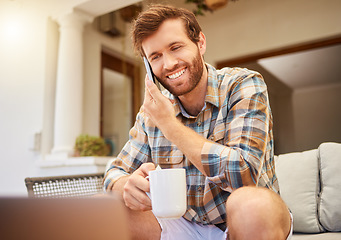 Image showing Communication, coffee and man with phone on sofa to relax in living room. Success, internet and working from home with tea. Happy man sitting, relaxing with a laptop and on mobile call on the weekend