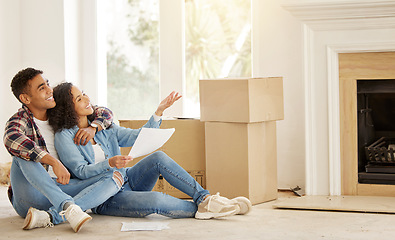 Image showing Real estate, house and couple in new home after their property investment and moving in together by boxes on the floor. Interior, smile and young man and woman love investing in residential housing