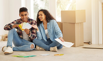 Image showing Couple with choice for paint color and renovation in a living room at home. Discussion on color pallet for a creative or design in house. Man and woman in conversation about painting creative idea