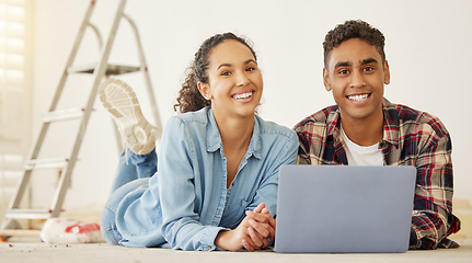 Image showing Home, renovation and laptop with a couple working on the internet, looking for an idea with a DIY project and remodel in their house. Portrait of a young man and woman building a domestic addition