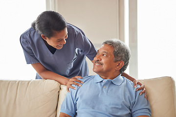 Image showing Healthcare, support and nurse working in senior care, bonding with patient showing affection in retirement home. Happy health care worker smiling, caring for mature man in an assisted living facility