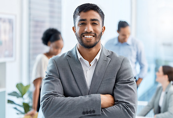 Image showing Coaching, motivation and happy, proud business leader in meeting with diverse colleagues in an office. Portrait male smiling during training with workers, discussing improvement and strategy planning