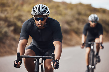 Image showing Training, energy and fitness with cyclists exercise on bicycle outdoors, practice speed and endurance. Athletes riding together, prepare for marathon or competition while enjoying cardio workout
