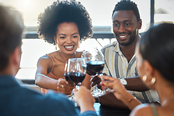 Image showing Cheers, celebrating and winning friends drinking wine together at a dinner celebration in a restaurant. Double date of loving and romantic couples dining and having fun on a weekend