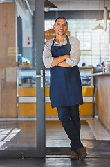 Image showing Entrepreneur of cafe or coffee shop, small business and male owner of a modern startup restaurant. Businessman with motivation, manager and leadership skills standing at the door to welcome customers