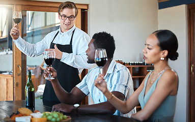 Image showing Wine tasting with black couple and professional sommelier explaining the blend and flavor of red wine. Couple enjoying a drink, learning about wine making process at a restaurant with happy winemaker