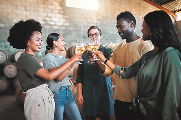 Image showing Friends wine tasting, giving cheers and toast celebrate with champagne glasses in cellar, distillery and brewery. Group of happy, diversity and smile people for event, social bonding and winery tour