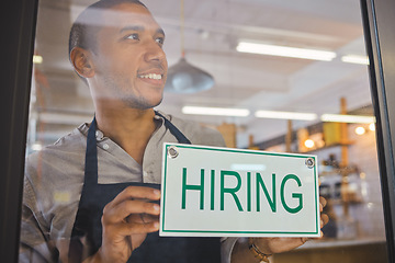 Image showing Recruitment, advertising and small business owner with hiring sign board on window or door of cafe or restaurant, happy and positive. Young business man excited open after end of covid virus pandemic