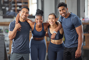 Image showing Fitness, exercise and diverse accountability group standing together and looking happy after training at gym. Portrait of friends enjoying their membership at a health and wellness facility