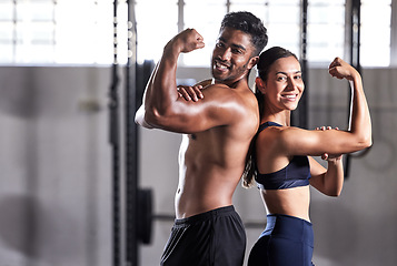 Image showing Fitness, flexing muscles and strong couple goals while doing exercise or training in a gym. Portrait of fit sports people, woman or man showing off their biceps after exercising for arm strength
