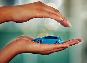 Image showing . Car, insurance and hands for transport mockup, investment or loan with bokeh background. Invest, travel and market advertising for product and marketing for retail, sale and finance.