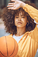 Image showing Serious basketball player playing ball for fitness training, doing wellness exercise and sport workout on the court. Active black woman exercising, looking confident and getting ready to play sports