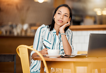 Image showing Thinking, wondering and planning woman having a coffee while working remotely on laptop at cafe. Freelance female writer daydreaming, thinking about a career change during tea break at a coffee shop