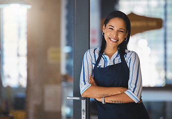 Image showing Cafe or coffee shop barista, entrepreneur and female small business owner of successful modern startup or restaurant. Happy, positive and empowered woman leader with welcoming door open for business