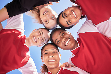 Image showing Female soccer team huddle bonding, smiling or motivated in circle with heads in middle. Below portrait of fit, active and diverse group of football girls, friends or athletes at sports, match or game