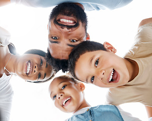 Image showing Smiling, fun and cute family playing, laughing and enjoying a day outside together on the weekend in summer. Portrait of the faces of carefree, joyful and happy parents huddling with children