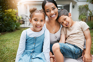 Image showing Family bonding, smiling and enjoying new house, garden and backyard as real estate investors, homeowners and buyers. Portrait of single mother, son and daughter with home insurance sitting together