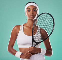 Image showing Woman sport tennis player and athlete feeling strong with female empowerment and motivation. Portrait of a fit, serious and young athletic indian lady looking motivated, determined and confident