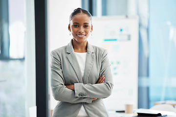 Image showing Proud, formal corporate businesswoman with arms crossed showing professional leadership, in marketing strategy presentation. Smiling employee standing in company boardroom for business meeting