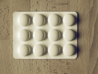 Image showing Vintage looking Medical pills on a table