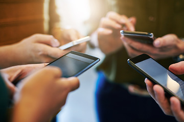 Image showing Phone communication, networking and texting with a group of hands in a circle huddle and reading or sending a message online. Closeup of people typing, surfing the internet or browsing social media