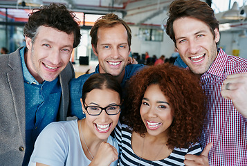 Image showing Fun, cheerful and casual business people celebrating in an office together. Portrait happy colleagues collaborating on startup, united, ambitious and confident. Workers with vision, plan or strategy
