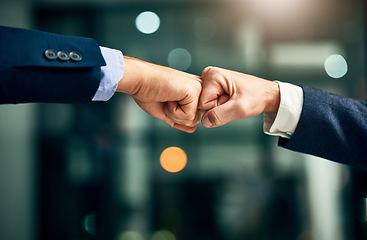 Image showing Partnership, teamwork and unity by hands fist bumping in support of a mission or goal. Business partners collaborating on a vision, community planning a strategy to support and succeed together