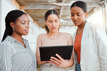 Image showing Collaboration, teamwork and working team with a tablet looking at digital data together. Group of female business office workers thinking and reading online web information planning a project outside