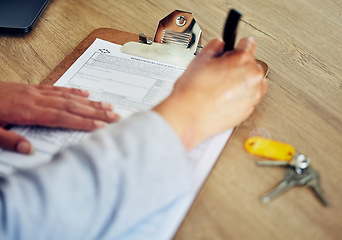 Image showing . Signing contract, document and paper closeup of banker, client or worker, writing or filling out information on insurance or loan form. Hands of woman completing legal agreement or tax compliance.