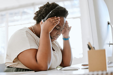 Image showing Stressed, tired and with a headache call center agent feeling pressure and anxiety while working in a demanding office. Overworked, exhausted consultant mentally frustrated with burnout and depressed