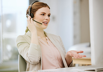 Image showing Sales consultant, call center agent and contact support employee helping clients with good customer service. Female working at the help desk busy talking and consulting about us and our loan prices