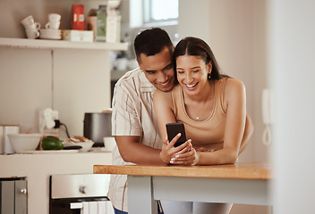 Image showing Happy, in love couple with a phone looking at funny content on social media, watching video or staying connected online. Bonding, romantic man and woman in relationship enjoying time together at home