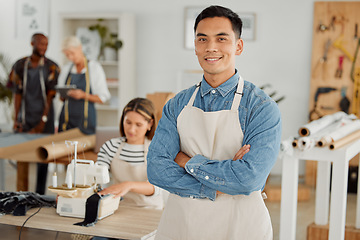 Image showing Proud clothing factory manufacturing manager portrait inside office. Small business owner of workshop feeling satisfied with his career choice. Entrepreneur, happiness and leadership with a smile.