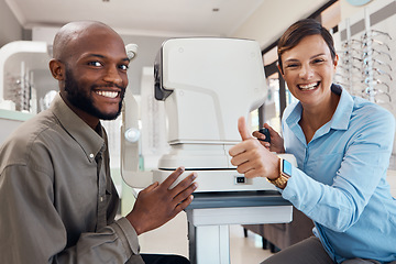 Image showing Eye doctor giving thumbs up after a successful vision test with a happy male patient, portrait. Smiling female optometrist gives a positive gesture after consulting, contact us to find out about us
