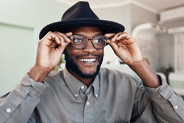 Image showing Trendy, smiling man wearing glasses, buying new eyewear and shopping for new frames at optometrist checkup. Face of a cheerful, cool and stylish male fitting frames at an optician office