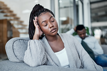 Image showing Sad, frustrated and tired woman ignoring husband during a fight, argument and conflict about divorce, breakup and relationship problems. Unhappy, stressed and depressed wife feeling sad in a marriage