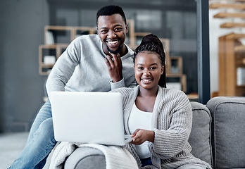 Image showing Happy couple browsing on a laptop, banking online and applying for a home loan, mortgage bond or insurance. Portrait of a black man and woman managing finances and studying with online education