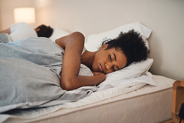 Image showing Sad, bad sleep and insomnia of a woman having relationship issues at home. Upset female or couple in the bedroom after having an argument. Depressed lady in thought and conflict with her husband.