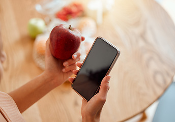 Image showing Online, health and apple organic fruit of woman holding phone and looking at nutrition value. Young female browsing diet and wellness plan or recipes to make for a healthy meal and lifestyle.