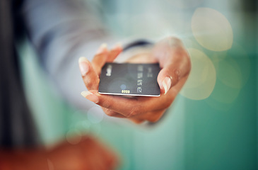 Image showing . Female hand holding a credit card to pay her debt, loans and mortgage at the bank during inflation. Closeup of a woman paying her financial bills. Lady making an investment in savings account.