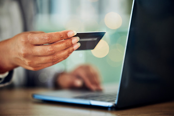 Image showing Ecommerce, banking businesswoman with laptop and credit card doing financial transaction, online shopping or payment. Corporate hands using a secure and safe ebank app for finance purchase at office