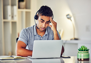 Image showing . Bored, tired and working customer service web support worker on an online computer call. Internet helpdesk male employee with a headset and headache feeling overworked from digital consulting job.