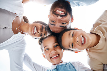 Image showing Huddled family bonding, laughing and having fun while standing in a circle with heads in the middle. Below playful portrait of excited, happy and cheerful mother, father and children close together