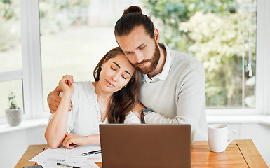 Image showing Support, couple and finances while embracing each other and sitting with papers and a laptop for bill payments and looking worried in a tough economy. Husband and wife having financial difficulties