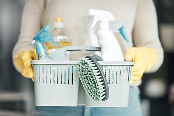 Image showing Closeup of house cleaning supplies, floor scrubbing and washing tools or products in an organized basket. Cleaner, housekeeper or maid with spray bottles and hygiene equipment for work or chores