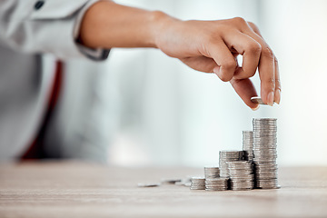 Image showing Saving, coins and growth for small business finance, stack of money for growing economy. Financial wealth and investment for profits, accounting or economics in the workplace over copy space.