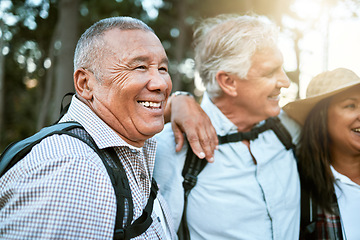 Image showing . Hiking, adventure and exploring with a carefree and excited male hiker with his senior friends outdoors. Enjoying a hike or walk in the forest or woods as a group of retired people for leisure.