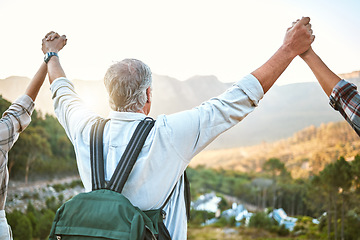 Image showing . Happy senior man hiking with friends, a celebration of the mountain view after holiday adventure trail in nature. Exercise to stay active, fit and healthy for lifestyle of wellness into retirement.